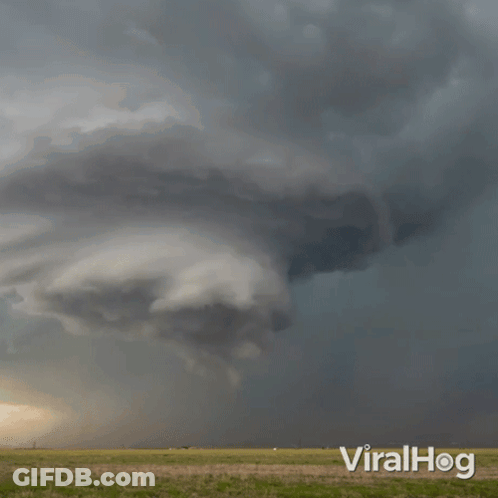 A Picture Of A Cloudy Sky With The Word Viralhog On The Bottom GIF