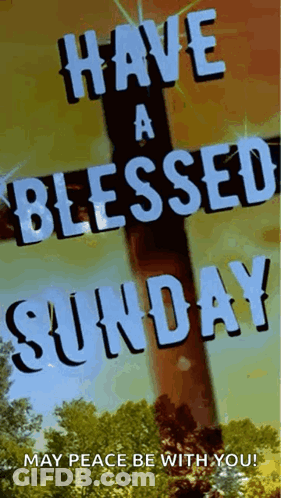A Picture Of A Cross That Says Have A Blessed Sunday May Peace Be With You GIF