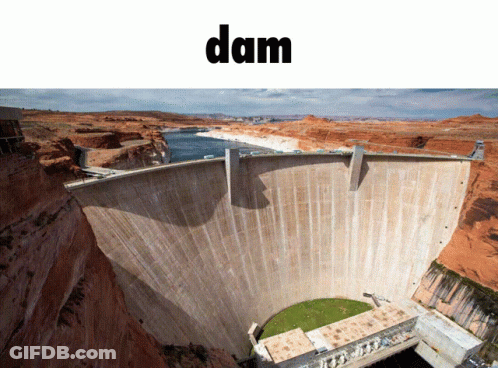 A Picture Of A Dam In The Desert With The Word Dam Above It GIF