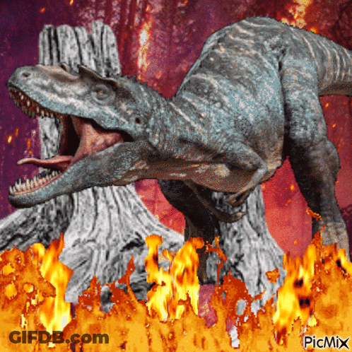 A Picture Of A Dinosaur Surrounded By Flames With Picmix Written On The Bottom GIF