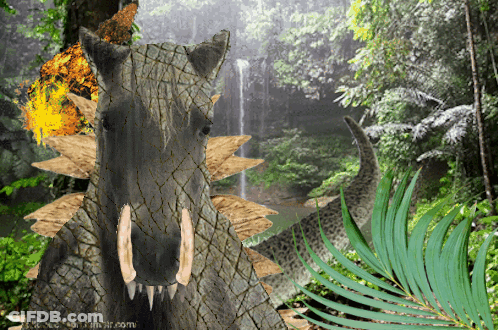 A Picture Of A Dinosaur With A Waterfall In The Background And The Website Pokemon.com Is Visible GIF