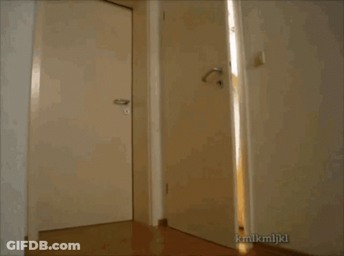 A Picture Of A Door With Kmlkmljkl Written On The Bottom GIF