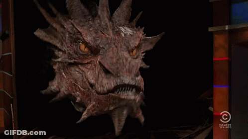 A Picture Of A Dragon And The Words Just Call GIF