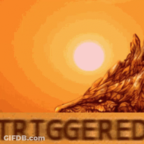 A Picture Of A Dragon With The Word Triggered In The Foreground GIF