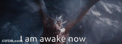 A Picture Of A Dragon With The Words I Am Awake Now Written Below It GIF