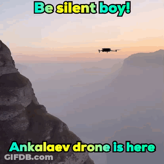A Picture Of A Drone Flying Over A Mountain With The Words Be Silent Boy And Ankalaev Drone Is Here GIF