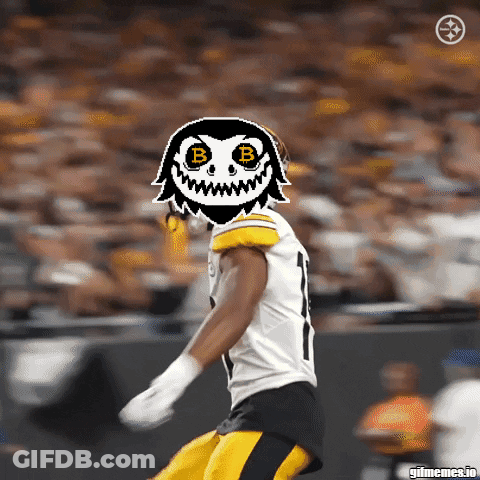 A Picture Of A Football Player With A Mask On His Face With The Letter B On It GIF