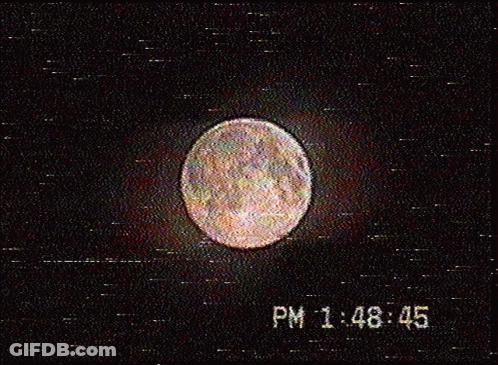 A Picture Of A Full Moon With The Time 1:48 45 GIF