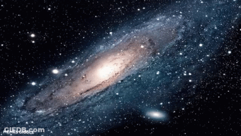 A Picture Of A Galaxy With The Words Memes Giggle On The Bottom GIF
