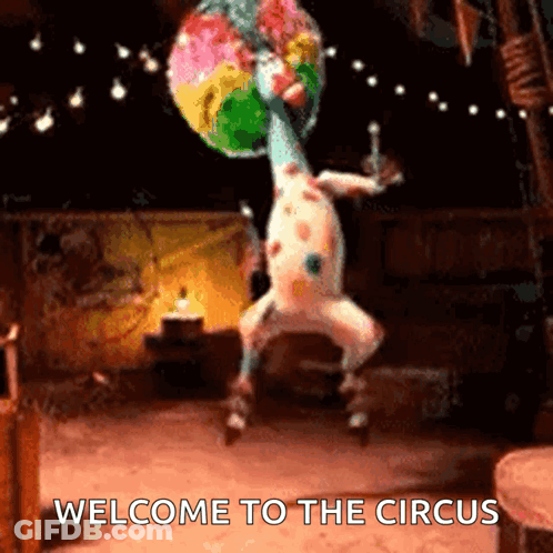 A Picture Of A Giraffe Dancing With The Words Welcome To The Circus GIF