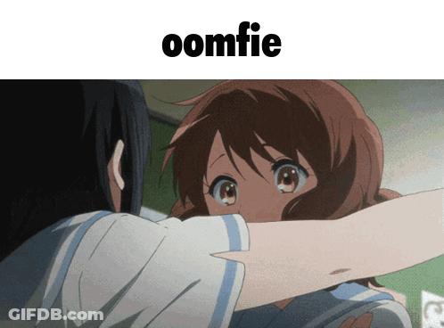 A Picture Of A Girl Hugging Another Girl With A Caption That Says ' Oomfie ' GIF