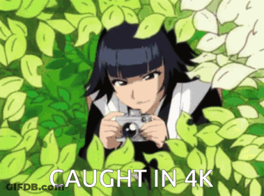 A Picture Of A Girl Taking A Picture With The Words Caught In 4K Below Her GIF