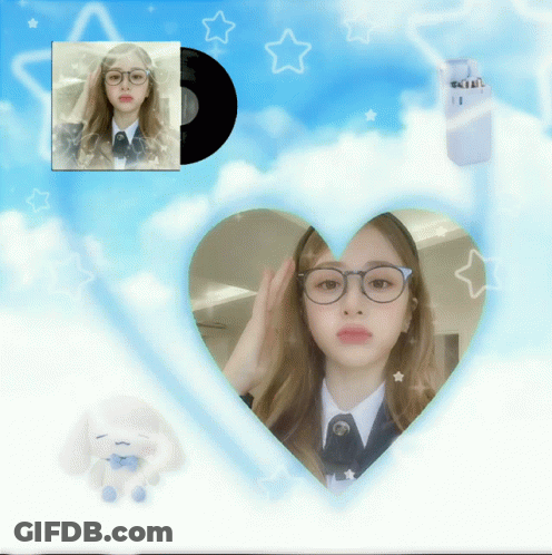 A Picture Of A Girl Wearing Glasses Is Surrounded By A Heart Shaped Frame GIF