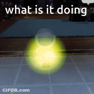 A Picture Of A Glowing Object With The Words " What Is It Doing " Above It GIF