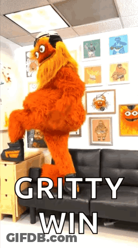 A Picture Of A Gritty Win Mascot Dancing GIF