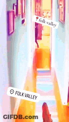 A Picture Of A Hallway With A Sticker That Says Folk Valley On It GIF