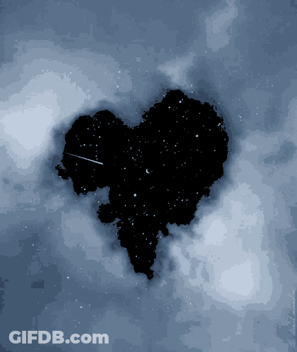 A Picture Of A Heart In The Sky With A Shooting Star GIF