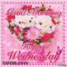 A Picture Of A Heart Shaped Bouquet Of Flowers With The Words Good Morning Happy Wednesday GIF