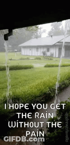 A Picture Of A House With Rain Coming Down The Gutter . GIF