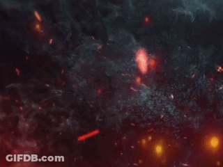 A Picture Of A Lion 'S Head With Flames Coming Out Of It GIF