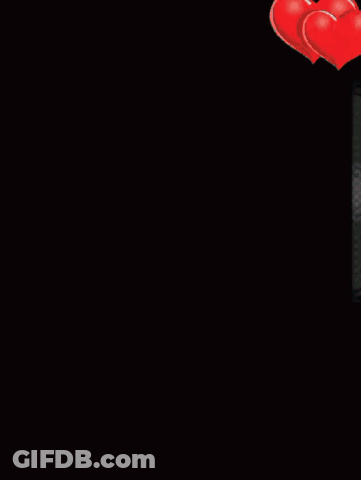 Man And Woman In Heart Frame GIF
