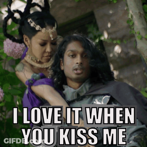 A Picture Of A Man And A Woman With A Caption That Says I Love It When You Kiss Me GIF