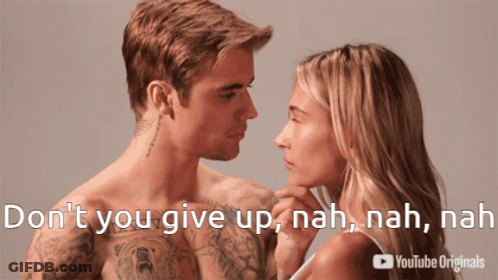 A Picture Of A Man And A Woman With The Caption " Do N't You Give Up " GIF