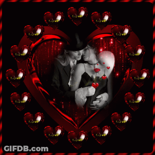 A Picture Of A Man And Woman Kissing In A Heart Surrounded By Hearts With The Word Love On Them GIF