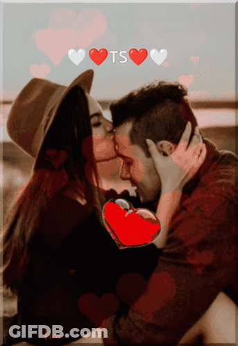 A Picture Of A Man And Woman Kissing With Hearts And The Word Ts Above Them GIF
