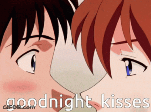 A Picture Of A Man And Woman Kissing With The Words Goodnight Kisses Above Them GIF