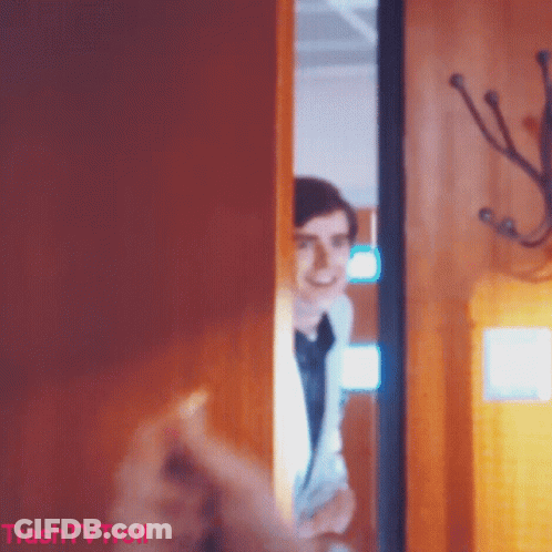 A Picture Of A Man Behind A Door That Says Trashtv Troll On It GIF