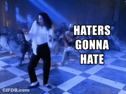 A Picture Of A Man Dancing With The Words Haters Gonna Hate On The Bottom GIF