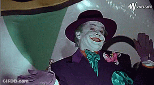 A Picture Of A Man Dressed As The Joker With Jwplayer In The Corner GIF