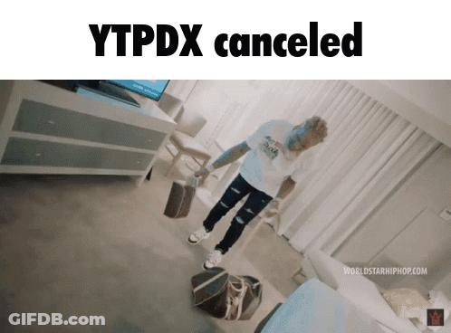 A Picture Of A Man Holding A Bag With The Words Ytpdx Canceled GIF