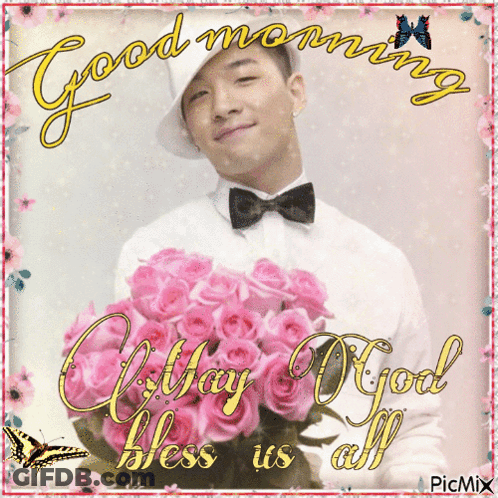 A Picture Of A Man Holding A Bouquet Of Pink Roses With The Words Good Morning May God Bless Us All GIF