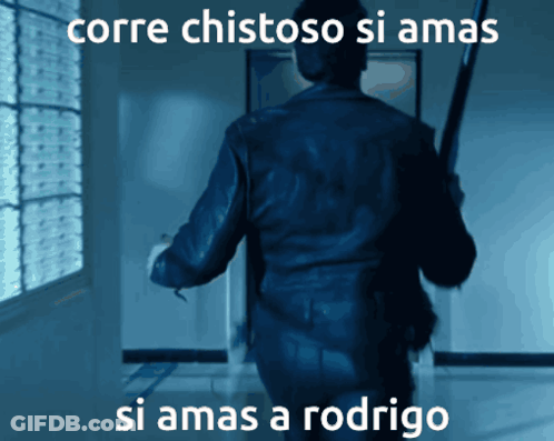 A Picture Of A Man Holding A Gun With The Caption Corre Chistoso Si Ama GIF