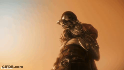 A Picture Of A Man Holding A Gun With The Hashtag #Furiosa On The Bottom GIF