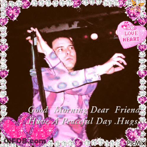 A Picture Of A Man Holding A Microphone With The Words Good Morning Dear Friend Have A Peaceful Day Hugs On The Bottom GIF