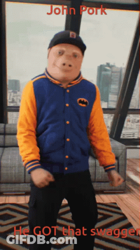 A Picture Of A Man In A Batman Jacket With The Caption John Pork GIF