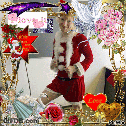 A Picture Of A Man In A Santa Suit With A Heart That Says Love On It GIF