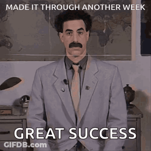 A Picture Of A Man In A Suit And Tie Says Great Success GIF