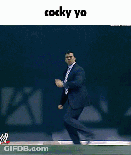 A Picture Of A Man In A Suit And Tie With The Caption Cocky Yo GIF