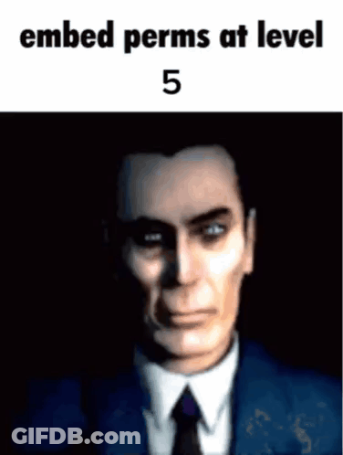 A Picture Of A Man In A Suit And Tie With The Words `` Embedded Perms At Level 5 '' GIF