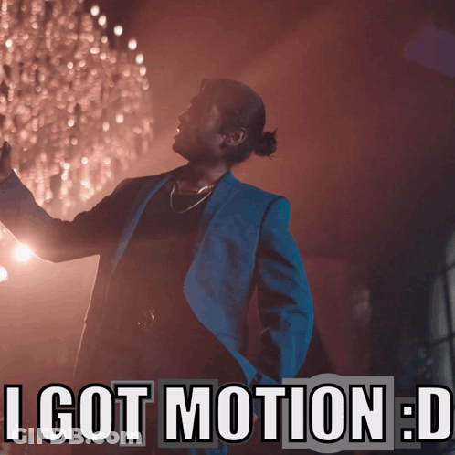 A Picture Of A Man In A Suit With The Caption I Got Motion GIF