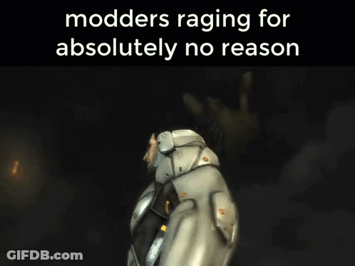 A Picture Of A Man In A Suit With The Words Modders Raging For Absolutely No Reason GIF