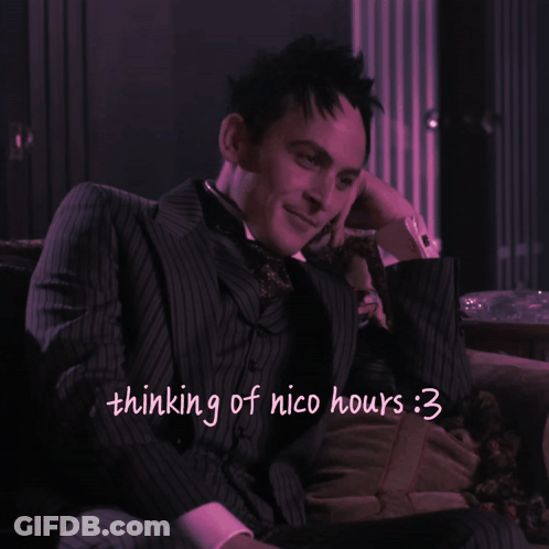 A Picture Of A Man In A Suit With The Words Thinking Of Nico Hours Written Below Him GIF