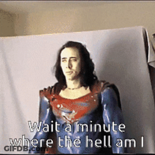 A Picture Of A Man In A Superman Costume With The Words Wait A Minute Where The Hell Am I GIF