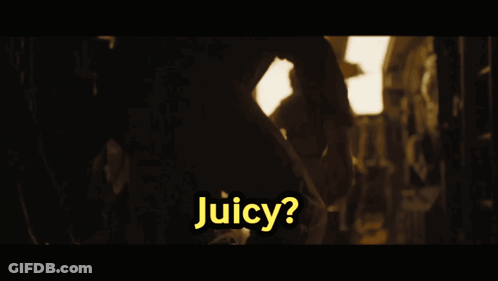 A Picture Of A Man In A Vehicle With The Words Juicy Juicy Below Him GIF