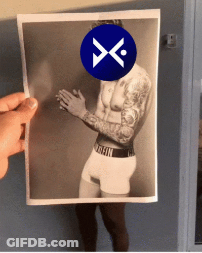 A Picture Of A Man In Calvin Klein Underwear Is Being Held Up By Someone GIF