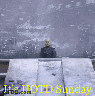 A Picture Of A Man In The Snow With The Words " It 'S Hot Sunday " GIF